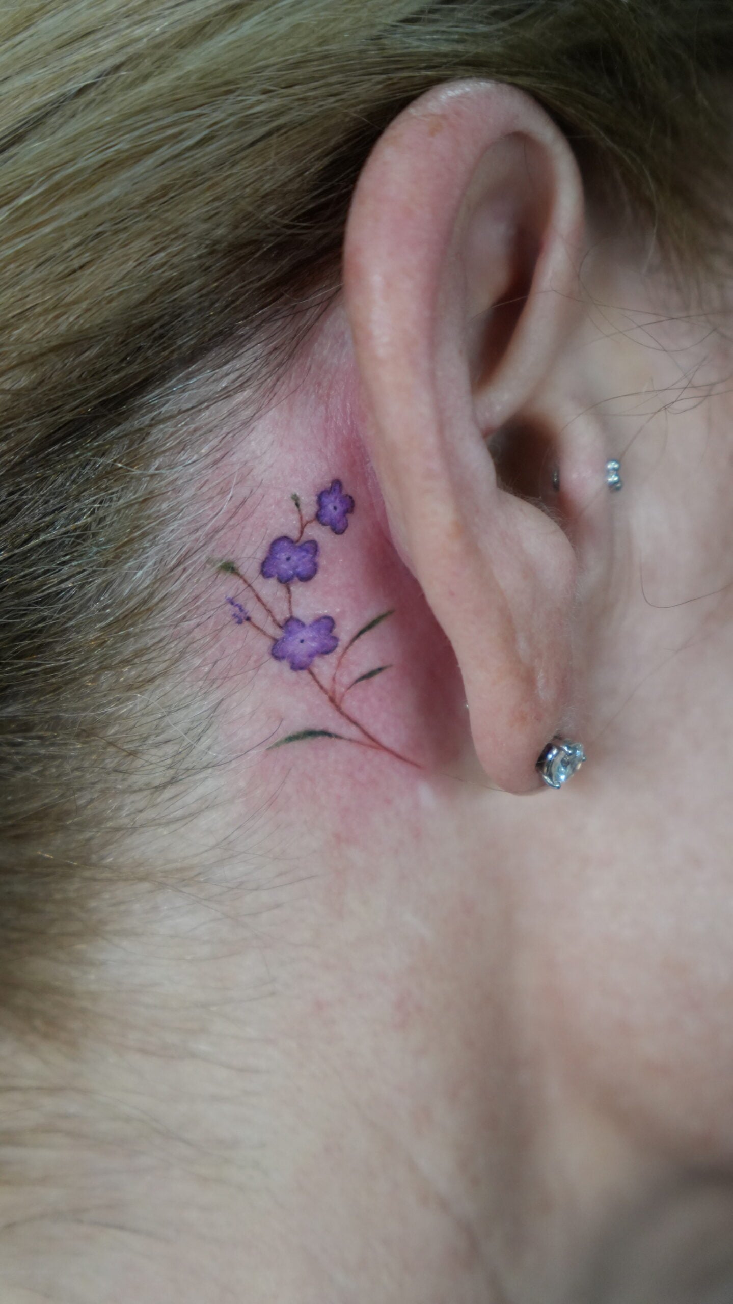 behind the ear tattoo pain level