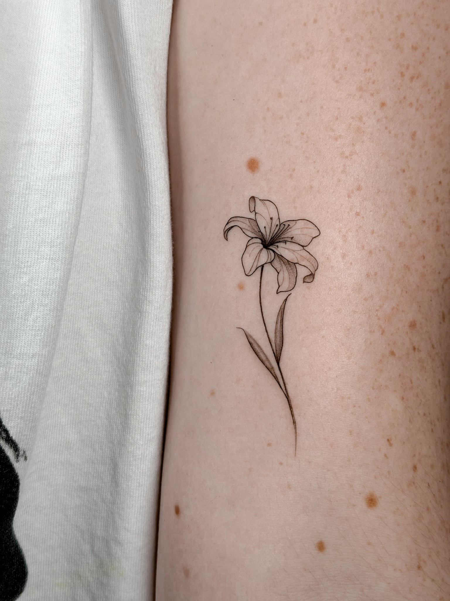fine line floral tattoo artist nyc